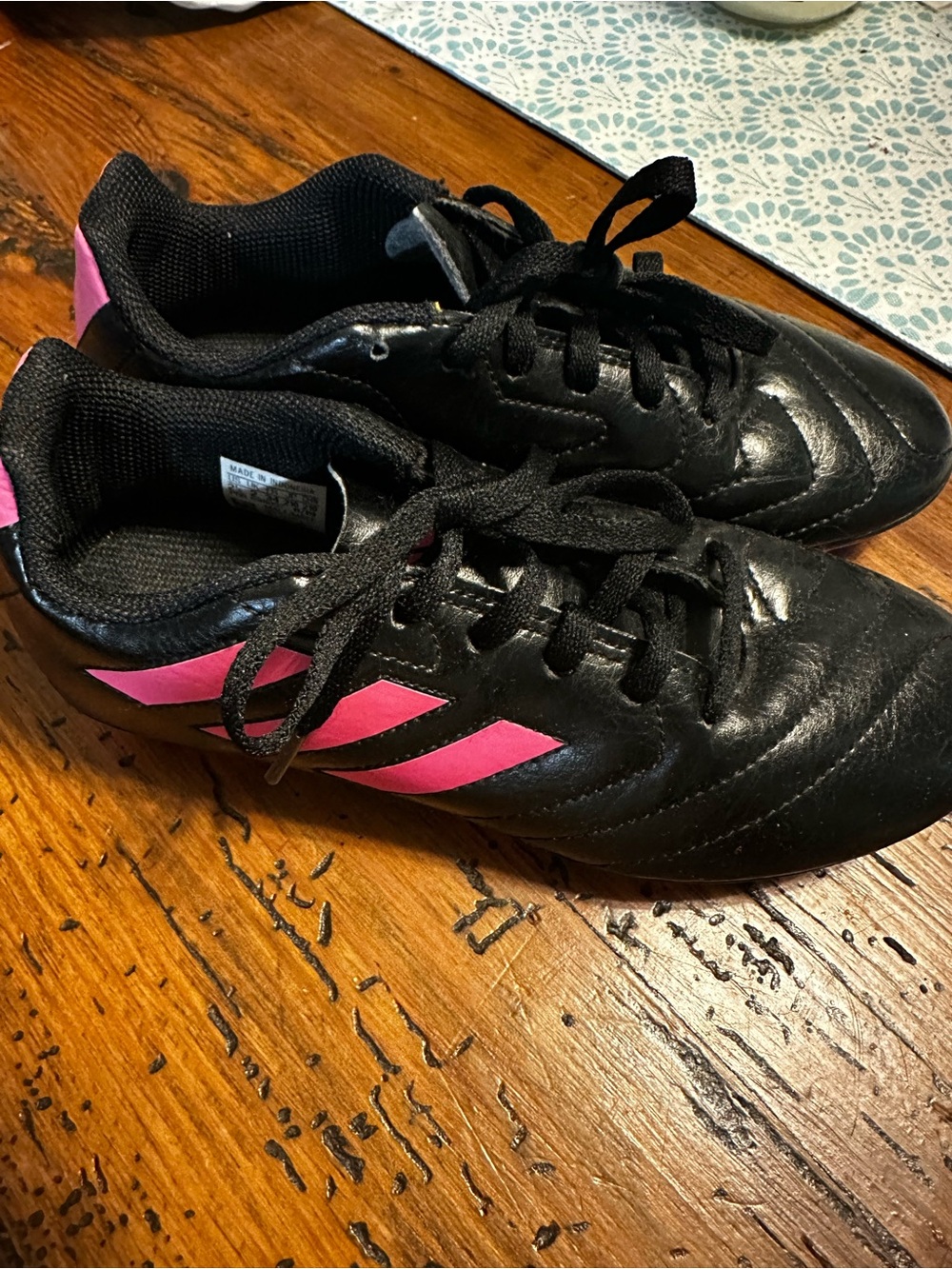 adidas Kids Black soccer cleats with Pink Stripes